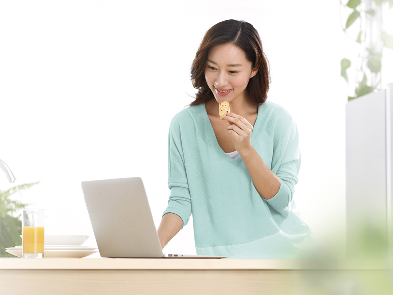 Lady eating bar