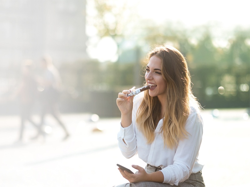 Woman eating nutrition bar